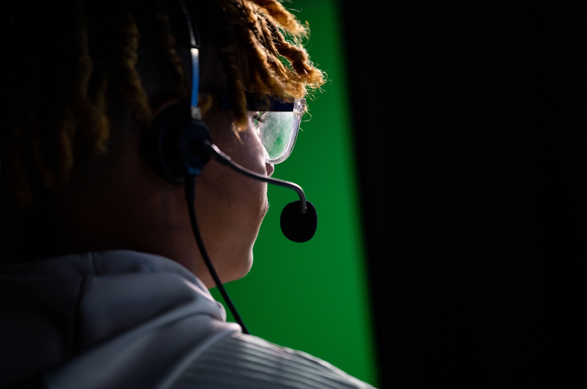 Student speaking into a microphone